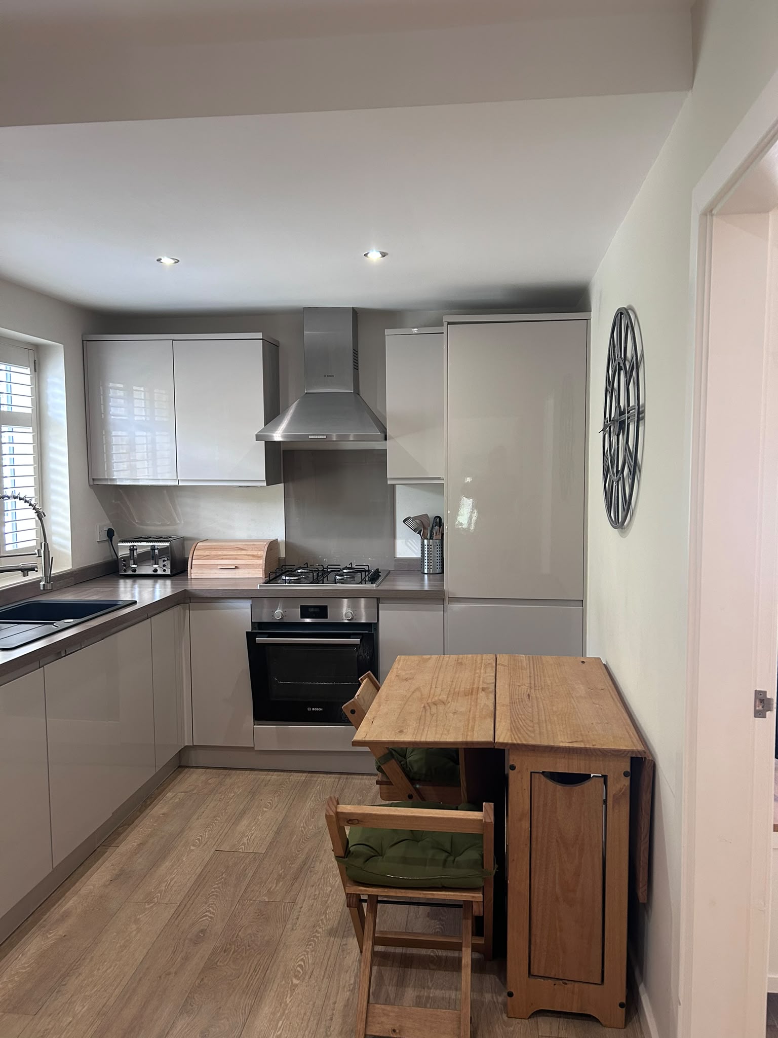 Clean, tidy kitchen after a standard clean by Freshlayer Cleaning in Leeds